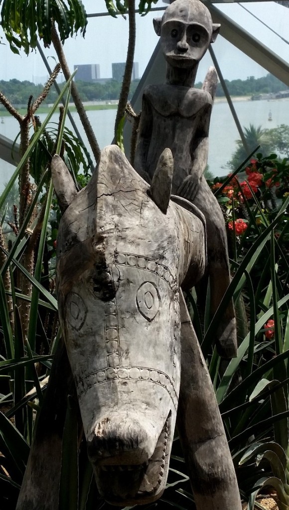 One of a number of sculptures within the Flower Dome gardens. This one is a wood carving from Timor.